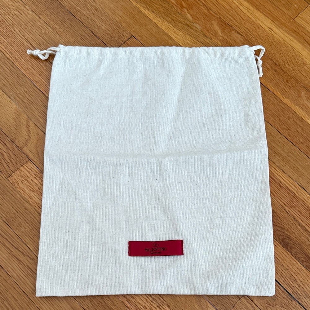 Valentino Cream Dust Bag with Red Logo